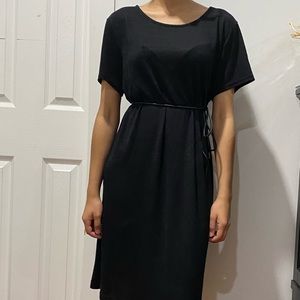 A short loose black dress